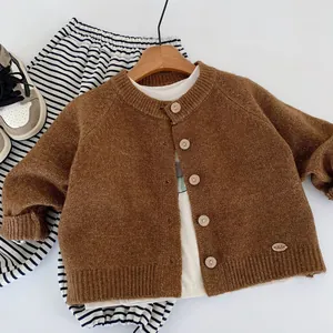 Kids brown knit cardigan with white t-shirt and striped pants outfit set