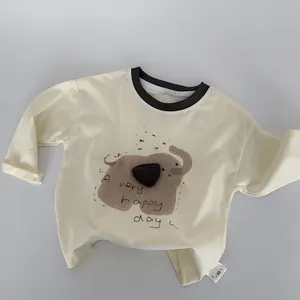 Close-up of baby long-sleeve tee with elephant print and 'A very happy day' text