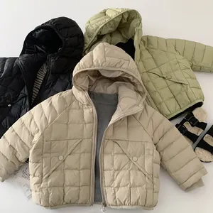 Detailed quilted texture and pockets of children's hooded puffer jackets in three colors