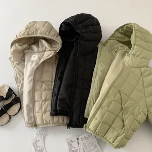 Kids triple-proof hooded down jacket in beige, black and green with horizontal quilting