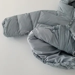 Kids' light blue 90% white duck down jacket with quilted texture and zipper pockets