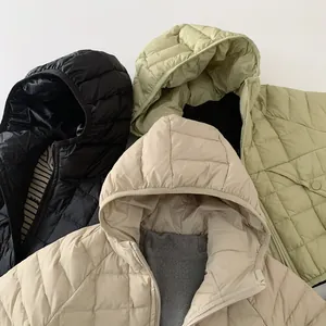 Detailed flat lay of quilted hooded down jackets in black, beige, and light green colors
