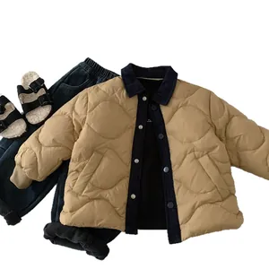 Kids beige quilted down jacket with navy corduroy collar and black denim pants