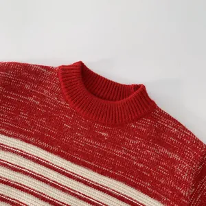 Detail of red and white striped knit sweater showing soft ribbed neckline texture