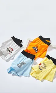 Close-up of four-pack boys' cotton boxer briefs with colorful patterns and elastic waistband