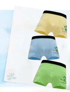Three-pack cotton boy boxers in blue, yellow and green with cute dinosaur prints
