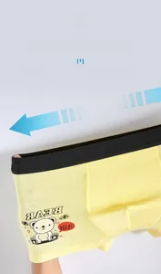Detail showing the high elastic waistband and stretchable fabric of the boys' cotton boxers