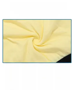 Close-up of soft yellow combed cotton fabric texture for boys boxer briefs