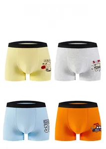 Detail view of four-pack boys' cotton boxer briefs with cute cartoon prints and U-pouch