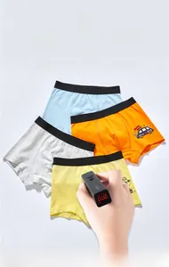 Testing for zero fluorescence on cotton boxer briefs for boys in a four-color set