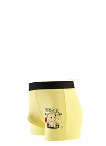Detail of boys yellow cotton boxer briefs featuring wide waistband and seamless design