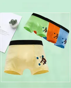 Flat lay of four colorful cotton boxer briefs with bear patterns and elastic waistbands