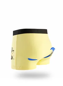 Detail of yellow cotton boys boxer briefs featuring anti-pinch fit and soft waistband