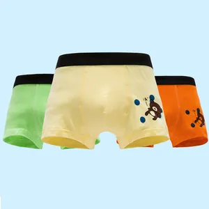 Three-pack of cotton boys' boxer briefs in green, yellow, and orange with cartoon bear prints