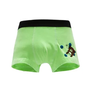 Green cotton boxer briefs for boys featuring a cute brown bear print and elastic waistband