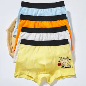 Four-pack of colorful cotton boxer briefs for boys with elastic waistband and cartoon bear