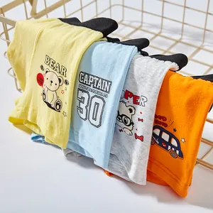 Pack of boys' cotton boxer briefs with colorful cartoon prints and elastic waistbands