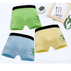 Three-pack cotton boys boxer briefs with dinosaur print and elastic black waistband