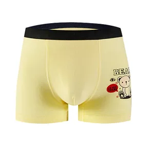Breathable cotton boxer briefs for boys in yellow with cartoon bear and elastic waistband