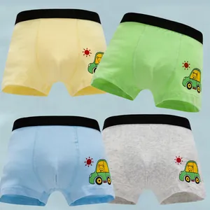 Soft cotton boy's boxer briefs featuring colorful car prints and elastic waistbands