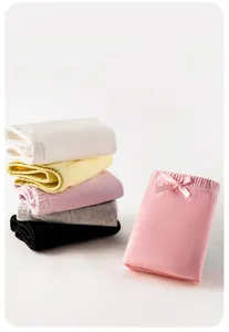 Detail of soft cotton kids safety shorts with elastic bow waistband in multi-color pack