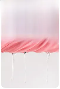 Detail of pink cotton girl leggings fabric showing high elasticity and soft texture