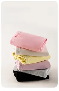 Detail of girls' cotton boxer briefs set with elastic waistband and bow decoration