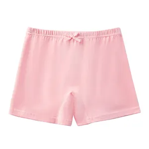 Short de sécurité rose en coton pour filles avec taille élastique et petit nœud sur fond blanc