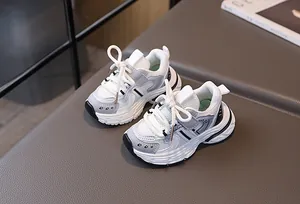 Detail view of children's breathable mesh sneakers with non-slip soles and round laces