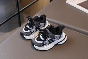 Detail of kids breathable mesh sneakers with chunky anti-slip sole and sport velcro strap