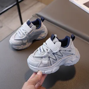 Baskets en maille respirante pour enfants en gris et bleu avec semelle épaisse antidérapante
