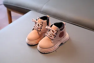 Bottines Martin roses pour tout-petits avec fermeture éclair latérale et semelle épaisse