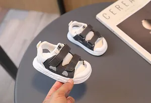 Detailed view of kids closed-toe sandals with breathable mesh and dual velcro straps