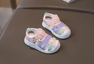 Detailed close-up of girls' colorful protective closed-toe sandals with bunny cartoon print