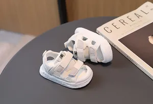 Top view of white breathable mesh kids sandals with protective closed toe and Velcro straps