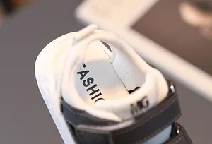 Detail shot of toddler sports sandals showing Velcro strap and breathable mesh upper