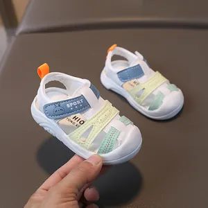 Blue and white breathable baby closed-toe sandals with non-slip soft soles and cartoon design