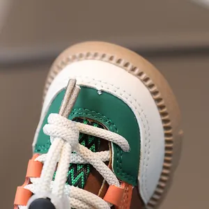 Kids color-block sneakers in green and orange with anti-slip rubber soles for boys