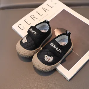 Quilted black toddler walking shoes with cute bear embroidery and non-slip rubber soles
