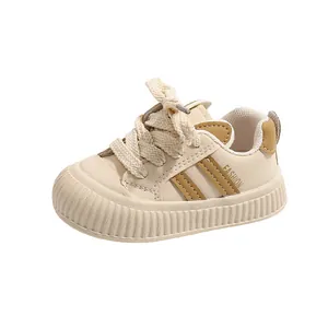 Beige infant sneakers with brown stripes and thick anti-slip soft soles for toddlers