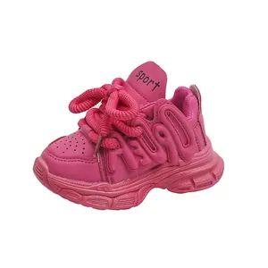 Hot pink chunky platform sneakers for girls with embossed letters and sporty woven laces