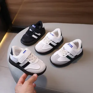 Retro kids sneakers with velcro straps and rubber soles in four classic colorways