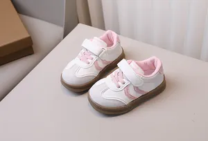 Detail of toddler sneakers with easy hook-and-loop closure and non-slip rubber soles