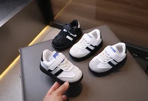 Detailed view of kids breathable sneakers with velcro straps and non-slip rubber soles