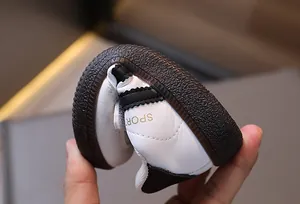 Macro shot showing high flexibility and resilience of the soft non-slip baby shoe sole