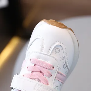 Kids white sneakers with pink laces and smiley patterns for girls in 2025 casual style