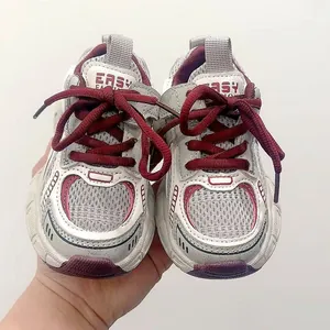 Kids breathable mesh sneakers in grey and burgundy with striped accents and laces