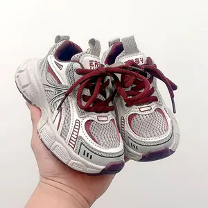Detailed close-up of breathable mesh and synthetic leather layers on kids' fashion sneakers