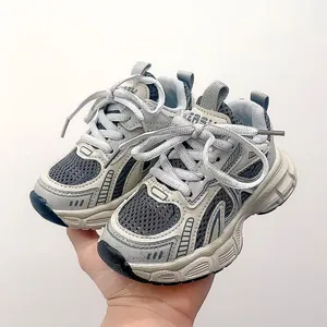 Detail view of children's mesh running shoe with thick cushioning sole and breathable upper