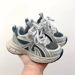 Breathable mesh children's sneakers in grey and navy blue with anti-slip soles